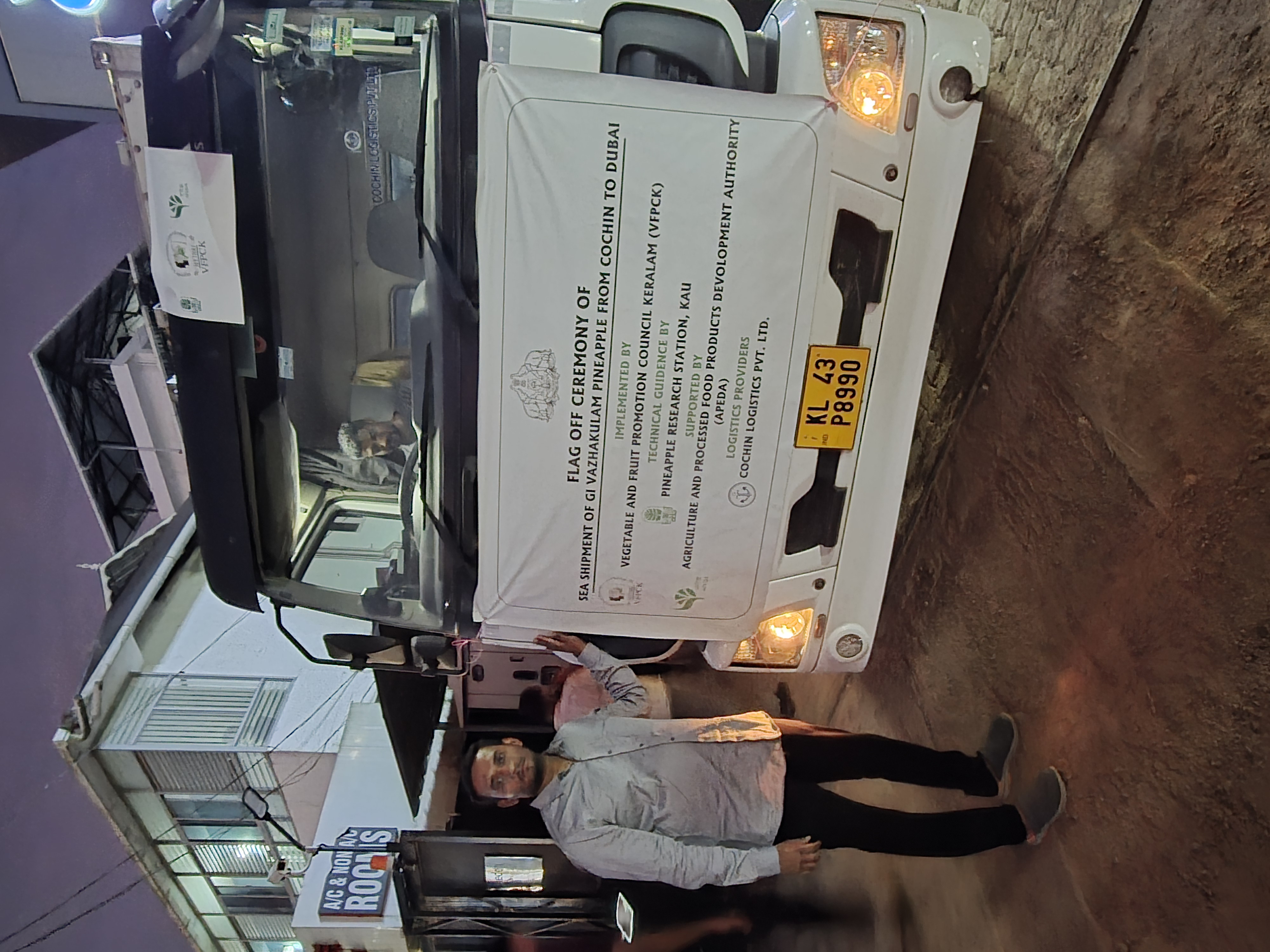 Flag-off ceremony banner on the truck for the sea shipment of GI Vazhakulam pineapple from Cochin to Dubai