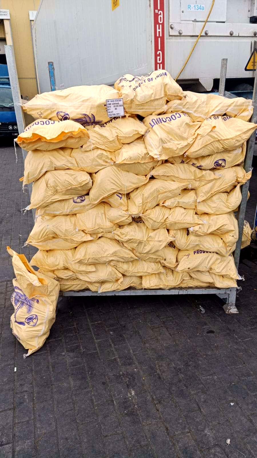 Sacked product stacked and staged for the container